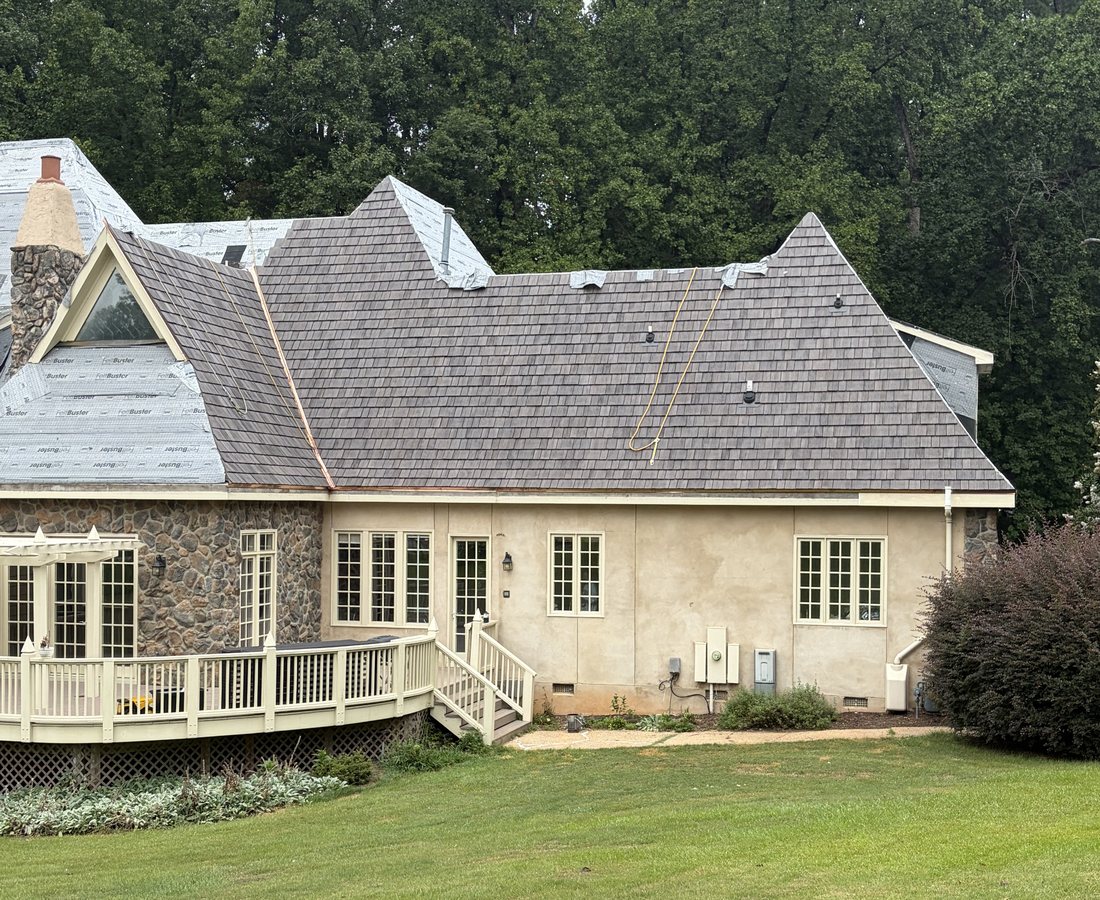 Completed roof replacement by roofers in Raleigh — new Brava synthetic roof