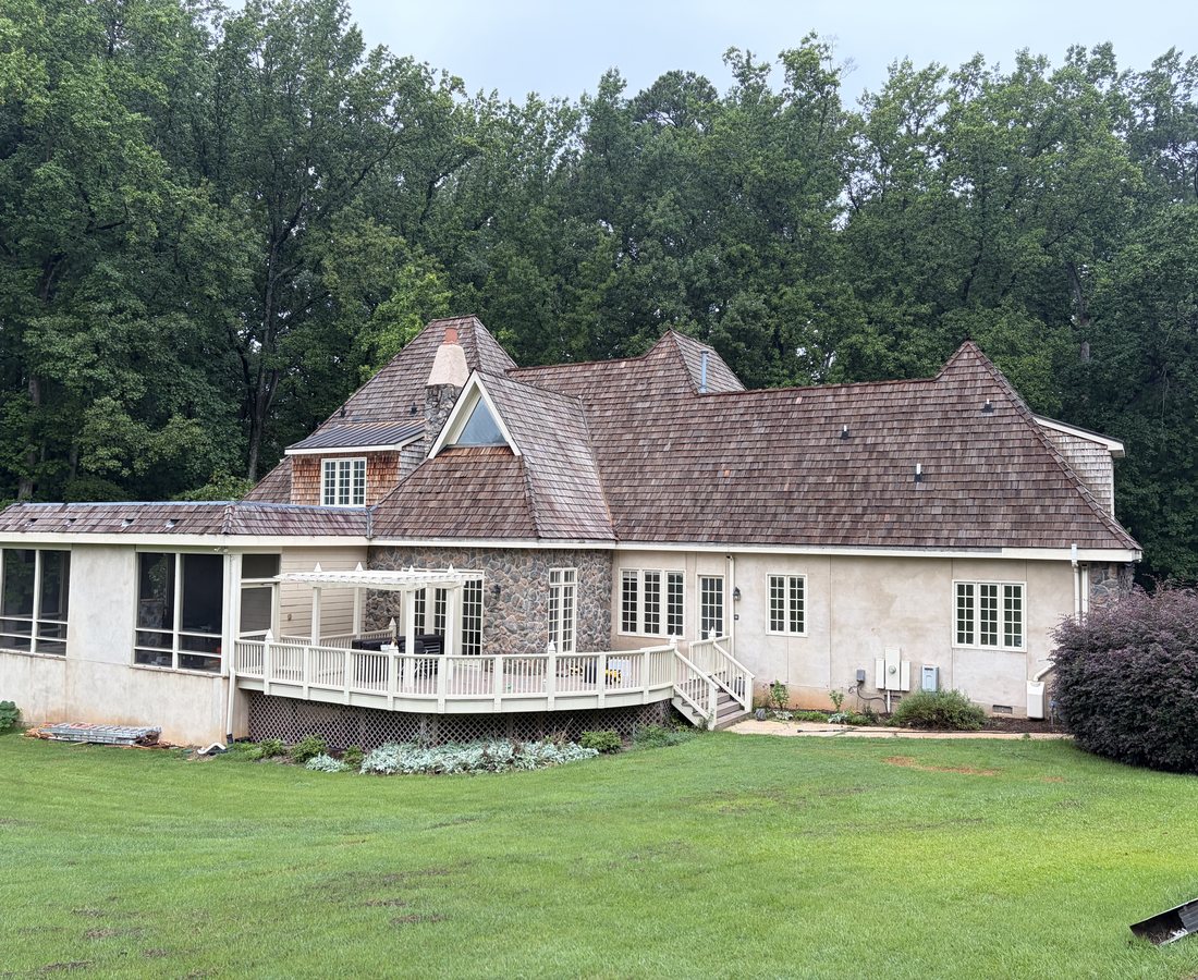 Before: weathered cedar shake roof in Raleigh, NC before replacement