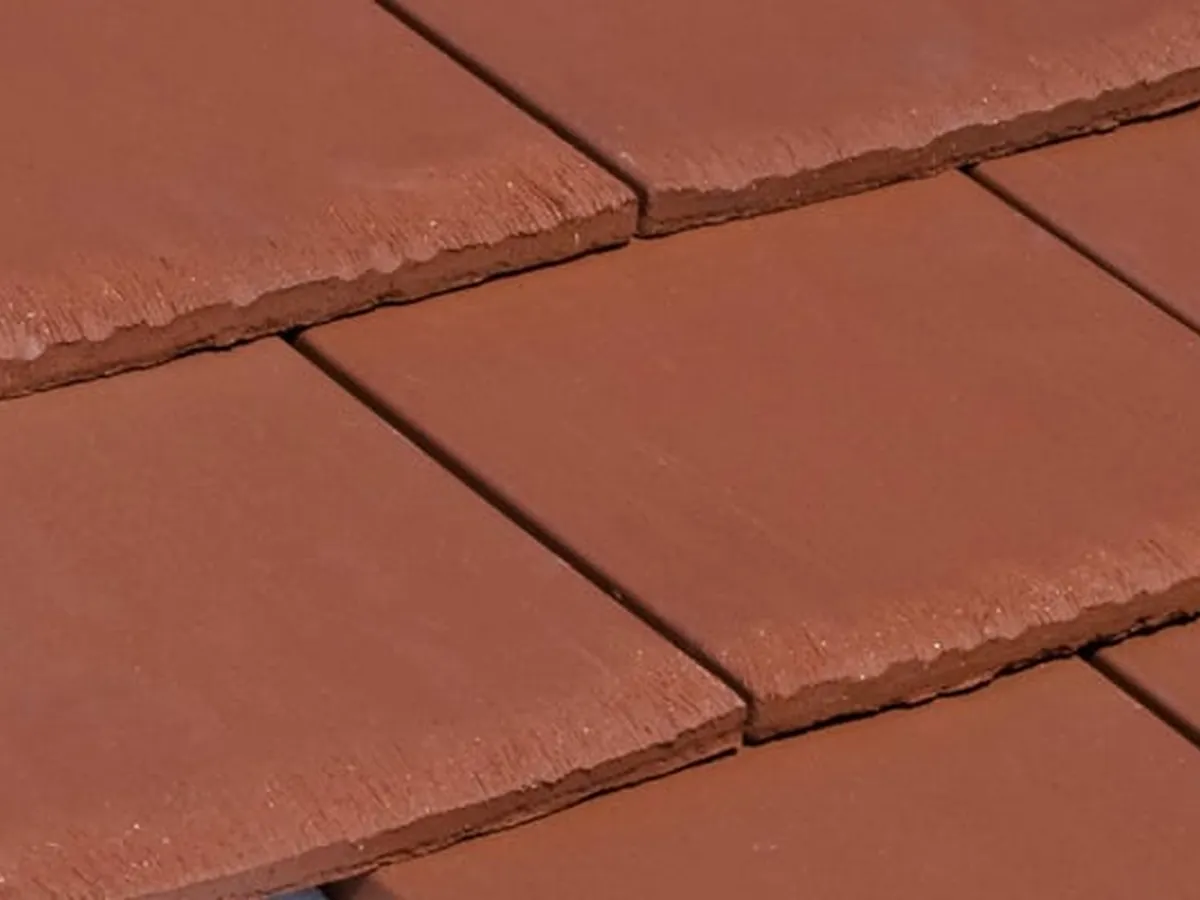 Flat concrete tile roof close-up