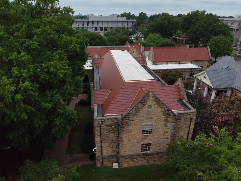 Commercial clay tile and copper roof by Cadmus Construction in North Carolina